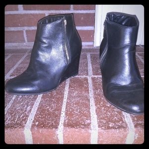 Black wedge booties
